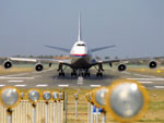 A head-on shot of a Malaysian Airlines B747-400 